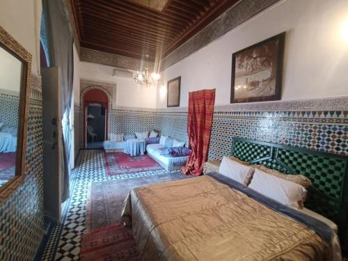 Voodi või voodid majutusasutuse Suite in a 19 century palace in the heart of Medina toas