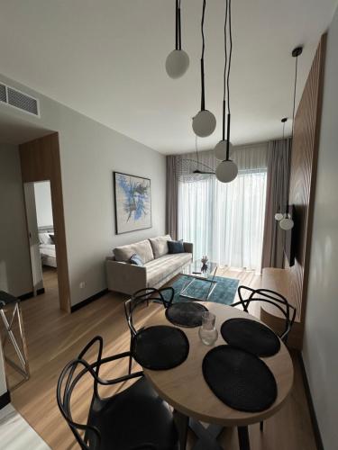 Postel nebo postele na pokoji v ubytování Aparthotel NAD ZATOKĄ Jezioro Ukiel