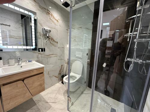 Koupelna v ubytování Aube Hivernage appartement