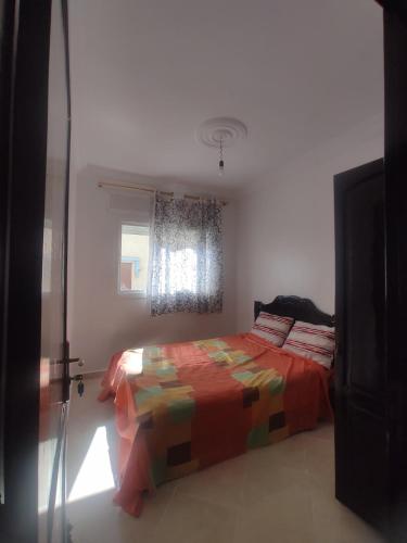 Postel nebo postele na pokoji v ubytování Cozy 2-Room Apartment for Rent in Martil