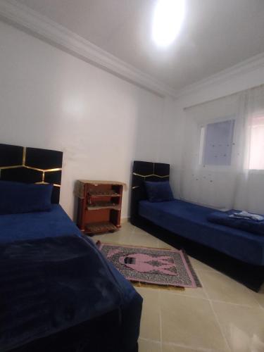 Postel nebo postele na pokoji v ubytování Cozy 2-Room Apartment for Rent in Martil
