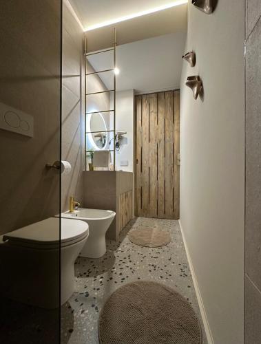 a bathroom with a toilet and a sink and a shower at Trabocco in Campagna in Lanciano