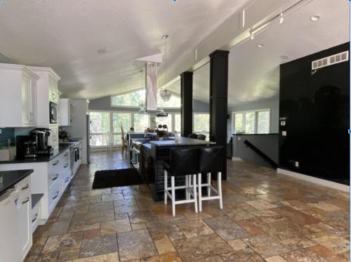 a large kitchen with a large island in a room at Large Recreational Retreat in Hudson