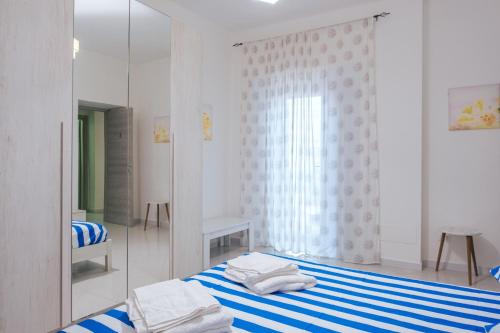 Ένα ή περισσότερα κρεβάτια σε δωμάτιο στο Vietri House 88