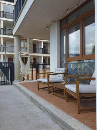 Costa Foz Apartment Playa de Llas, terraza, piscina y pista de pádel