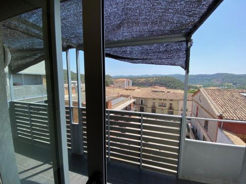 a view from the window of a balcony at Bonito apartamento en Avinyó con impresionantes vistas in Avinyó
