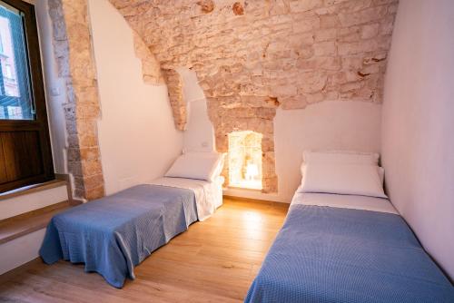 Postel nebo postele na pokoji v ubytování Porta Pentimi Apartment