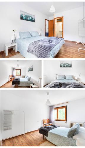 a white bedroom with a bed and a table at Benvinguts a Casa Nostra in El Pont de Suert