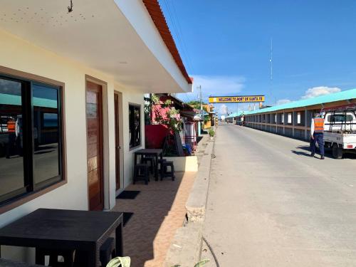 a train station with a person walking on the platform at Ideal for Families and Groups - Near Santa Fe Port in Ocoy