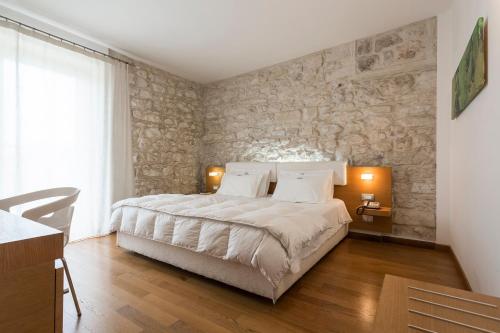 Cama o camas de una habitación en New Villa Carlotta