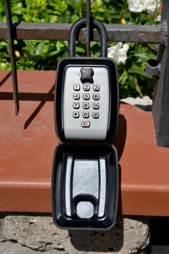 a cell phone is hanging on a bench at Casa del Lago in Bolsena