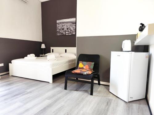 Postel nebo postele na pokoji v ubytování DUCEZIO rooms