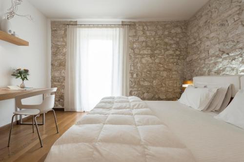 Cama o camas de una habitación en New Villa Carlotta