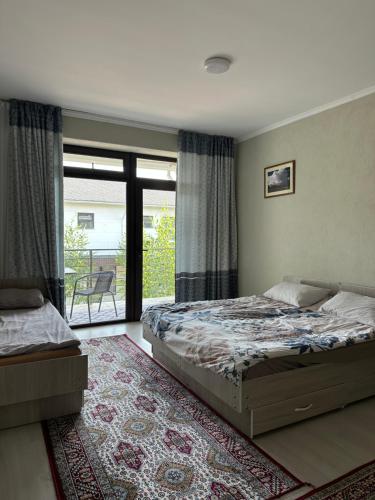 Llit o llits en una habitació de Таунхаус
