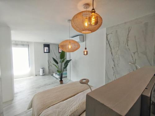 Ένα ή περισσότερα κρεβάτια σε δωμάτιο στο Le Spa du Bedat