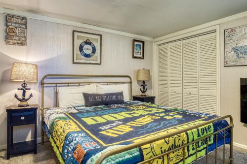 a bedroom with a bed and two night stands and two lamps at Live Luv Lake, Hot Tub, Private Boat Dock, WIFI,685 FREE tickets each paid day in Dandridge