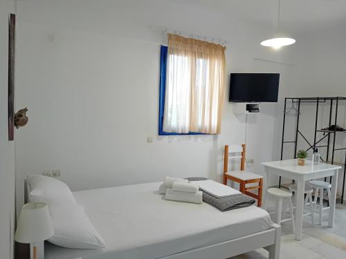 Postel nebo postele na pokoji v ubytování Ippokampos