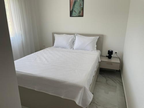 Postel nebo postele na pokoji v ubytování Greystone House Apartments