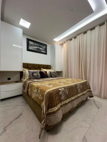 Postel nebo postele na pokoji v ubytování Aube Hivernage appartement