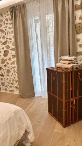 Ein Bett oder Betten in einem Zimmer der Unterkunft Le Palais Aubernon
