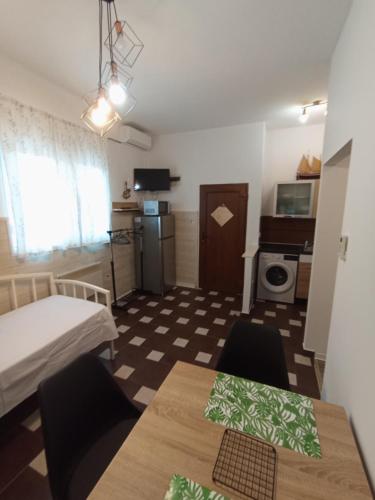 Kuchyň nebo kuchyňský kout v ubytování Adriatica Apartments