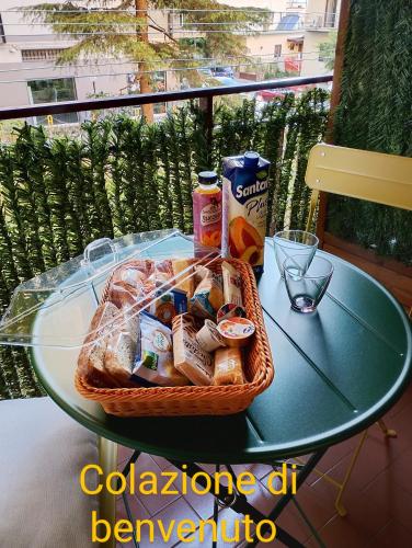 a basket of food on a table on a balcony at Mare Incanto in Gragnano