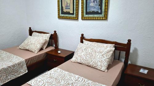 Llit o llits en una habitació de Sweet Home