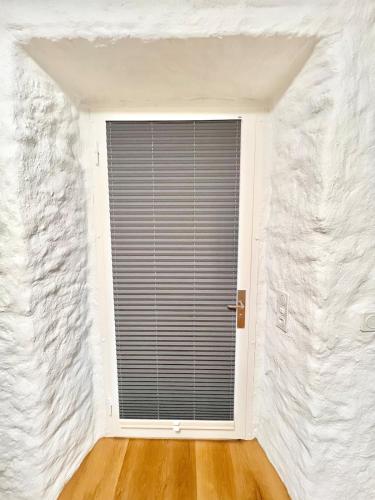 a window in a room with a white wall at 4 mins walk Thalwil Station, Free Parking, Historical in Thalwil