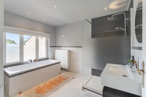 Postel nebo postele na pokoji v ubytování Vakantiewoning 't Hovenshuis