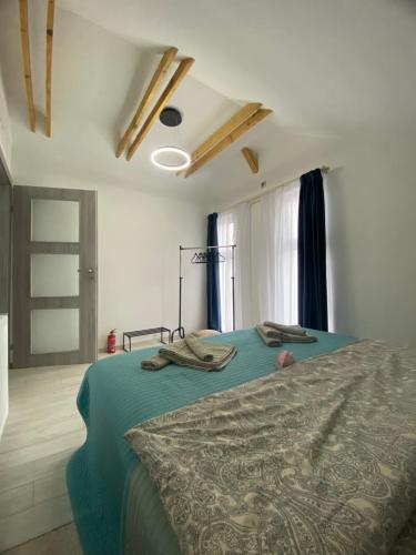 Postel nebo postele na pokoji v ubytování Chloe Loft