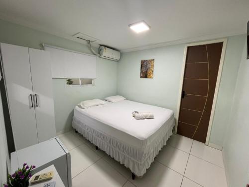 Кровать или кровати в номере Pousada Alameda Boa Vista