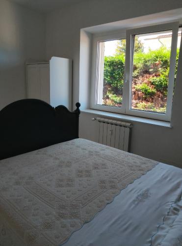 a bedroom with a large bed and a window at Villa Antonina 2 in Crecchio