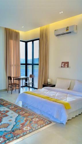 เตียงในห้องที่ Orchid vila