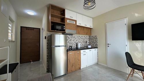 Kuchyň nebo kuchyňský kout v ubytování Neretva Apartments