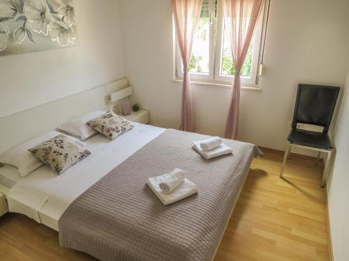 Posteľ alebo postele v izbe v ubytovaní Apartments Eddie