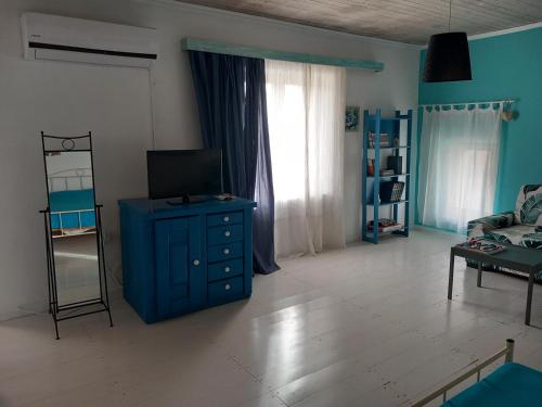 Et tv og/eller underholdning på Azul And The Blue Maisonette