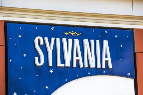 a blue sign with the word sylvania on it at Nightcap at Sylvania Hotel in Campbellfield