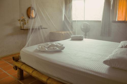Cama o camas de una habitación en Jaba Jan Hostal