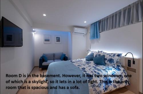 Кровать или кровати в номере Studio Inn Nishi Shinjuku