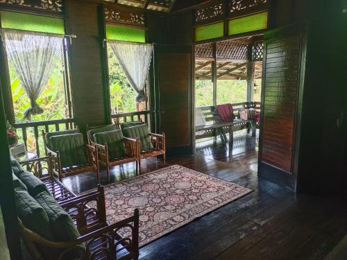 Posezení v ubytování Homestay Kampung Den