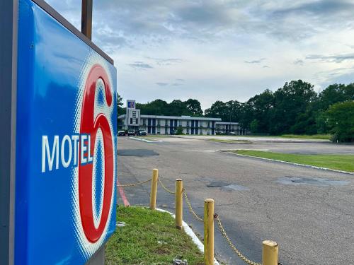 a sign in front of a mobil gas station at Motel 6-West Monroe, LA in West Monroe