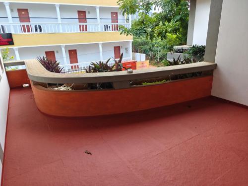 a boat sitting in the middle of a building at Sunsea Palacio Residency in Kuilapayam