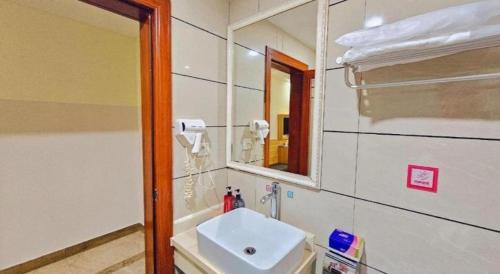 Bilik mandi di PAI Hotel·Huazhou Bus Terminal