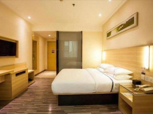 Letto o letti in una camera di City Comfort Inn Hotel Guilin Hongling Road