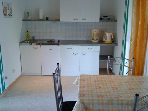 Dapur atau dapur kecil di Ferienwohnung am Storchennest