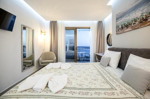Katil atau katil-katil dalam bilik di Creta Mare Hotel