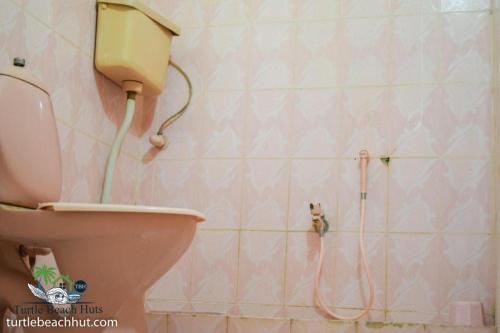 Koupelna v ubytování Nomads Beach Resort