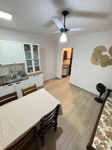 Ένα ή περισσότερα κρεβάτια σε δωμάτιο στο Flat dos sonhos