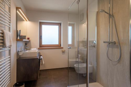 Ένα μπάνιο στο Planerhof Apartment Enzian
