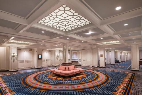a large room with a couch in the middle at Willard InterContinental Washington by IHG in Washington